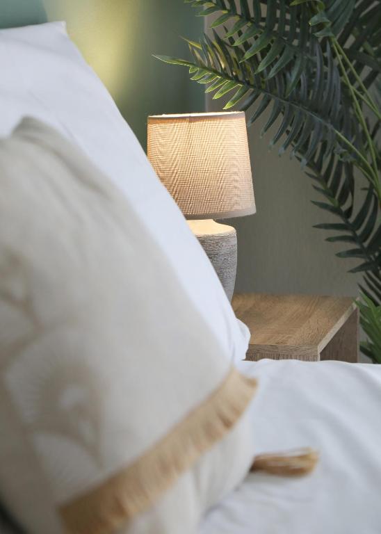 Posteľ alebo postele v izbe v ubytovaní Sitia Cozy Apartment