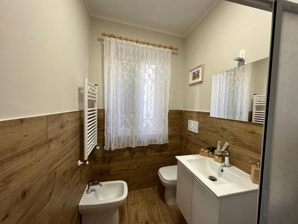 Koupelna v ubytování Nicarè Rooms