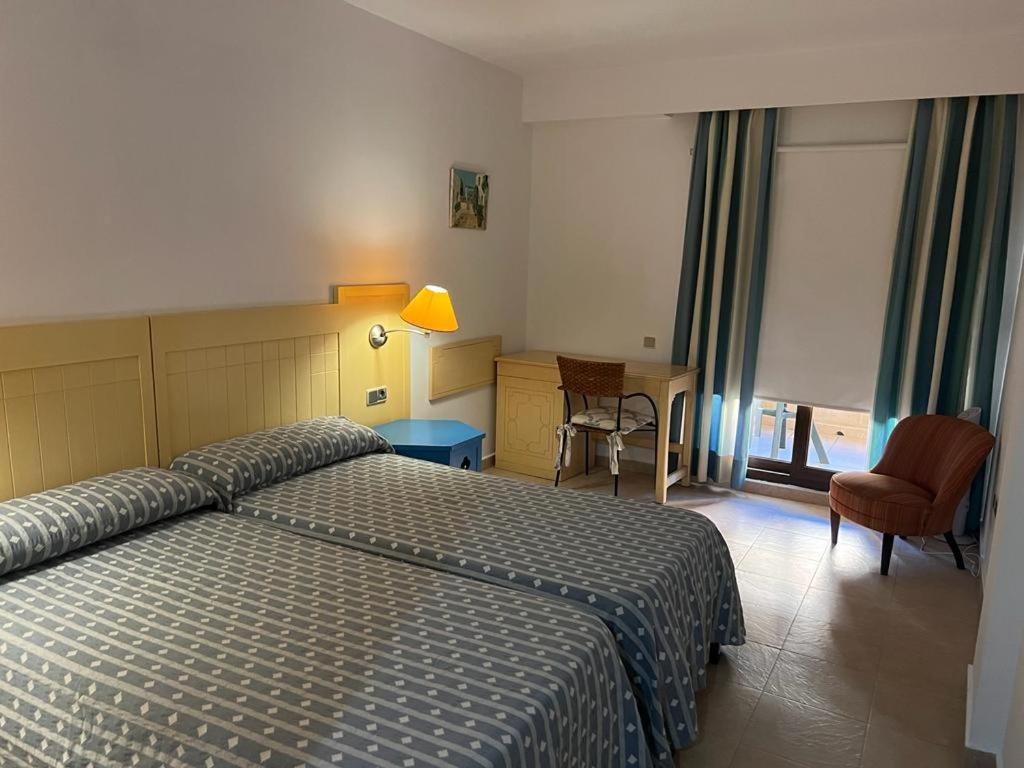 A bed or beds in a room at Jardines de isla canela (Punta del moral)
