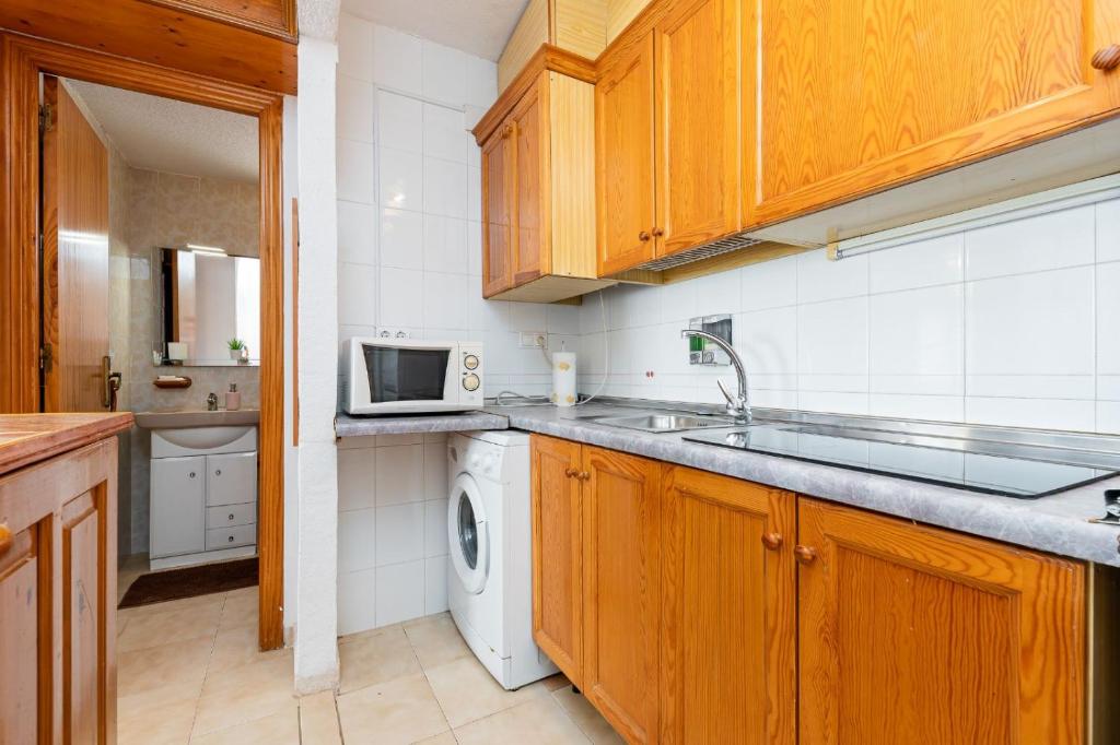 Kuchyň nebo kuchyňský kout v ubytování Casa lago jardin