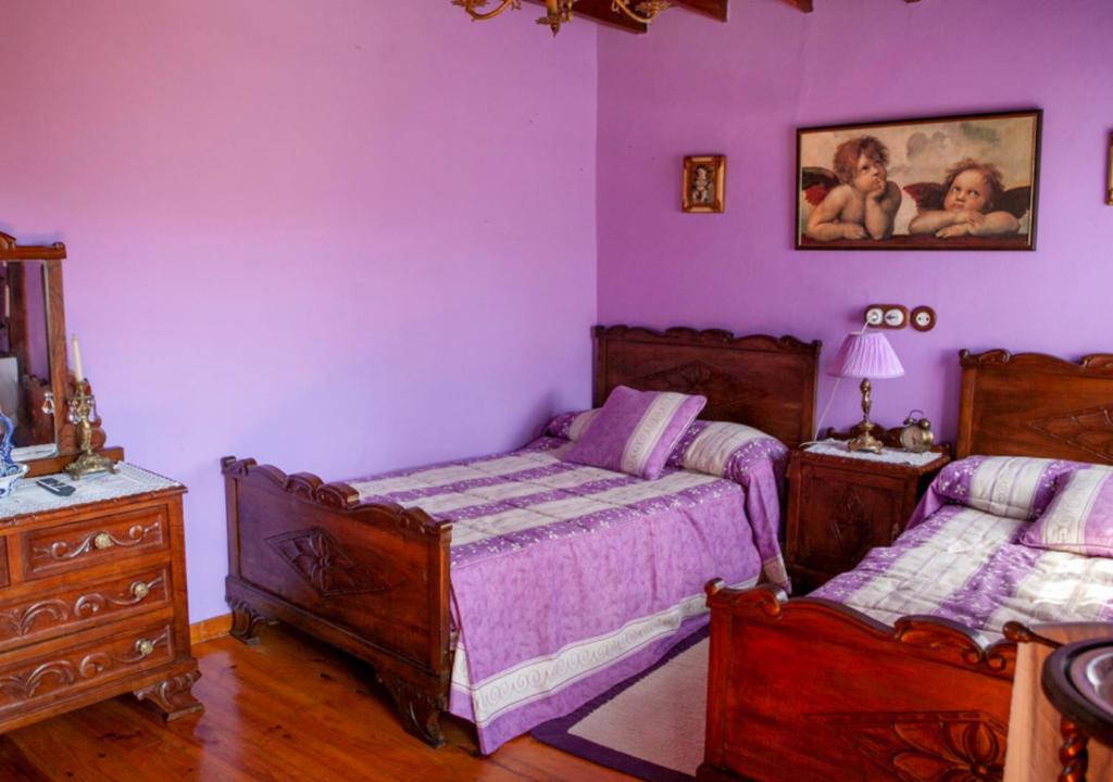Postel nebo postele na pokoji v ubytování Casa Rural La Aldea