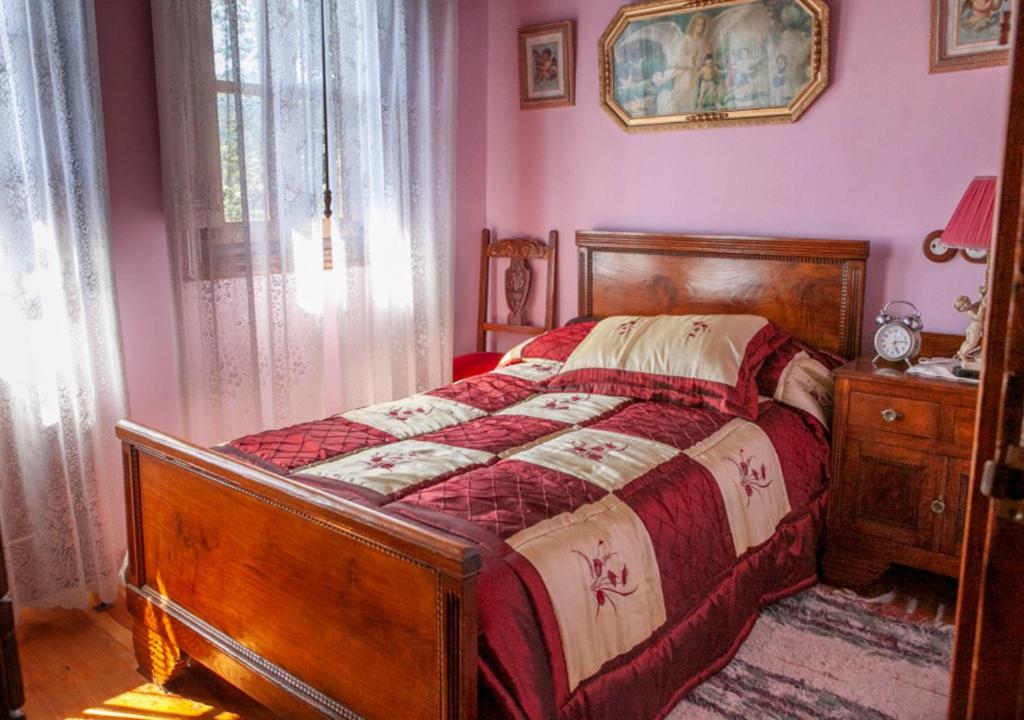 Postel nebo postele na pokoji v ubytování Casa Rural La Aldea