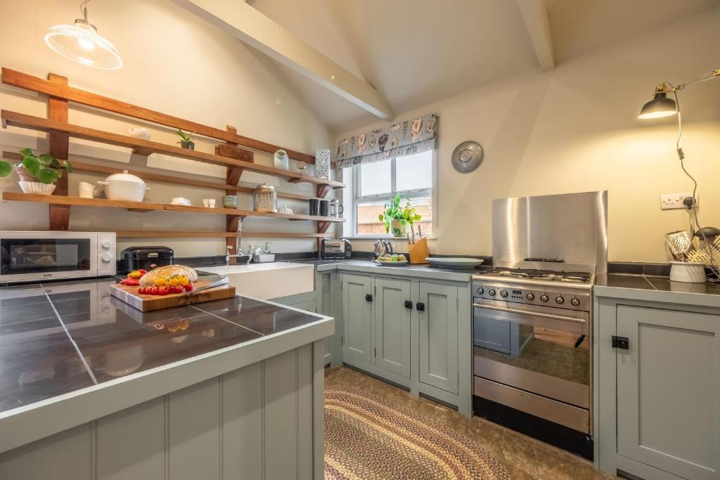Kuchyň nebo kuchyňský kout v ubytování Norfolk House