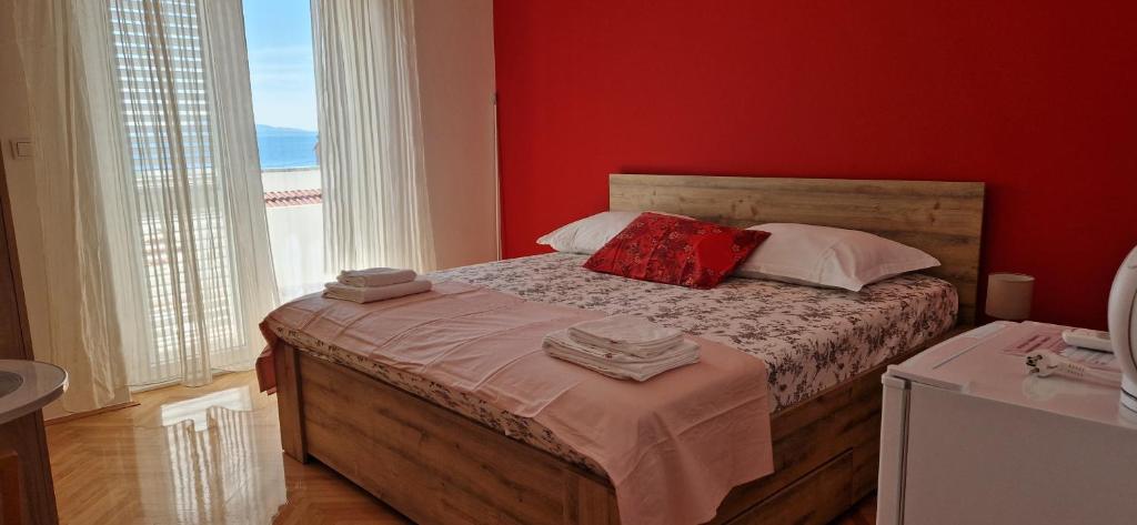 Postel nebo postele na pokoji v ubytování Rooms Bambina