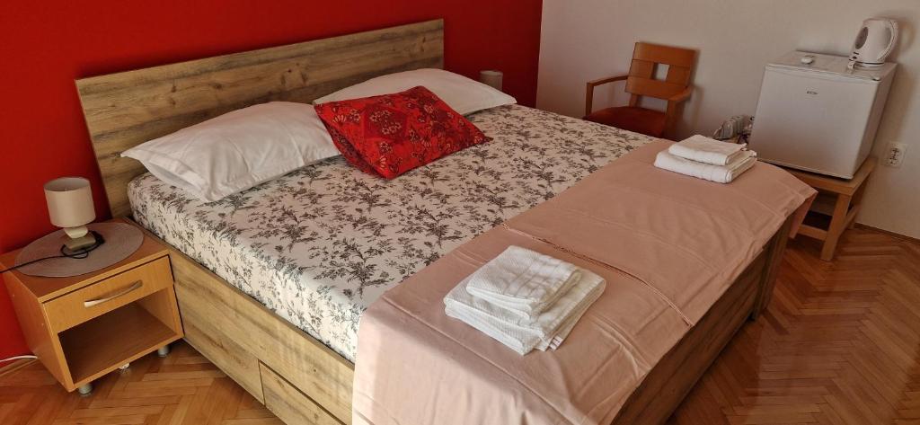 Postel nebo postele na pokoji v ubytování Rooms Bambina