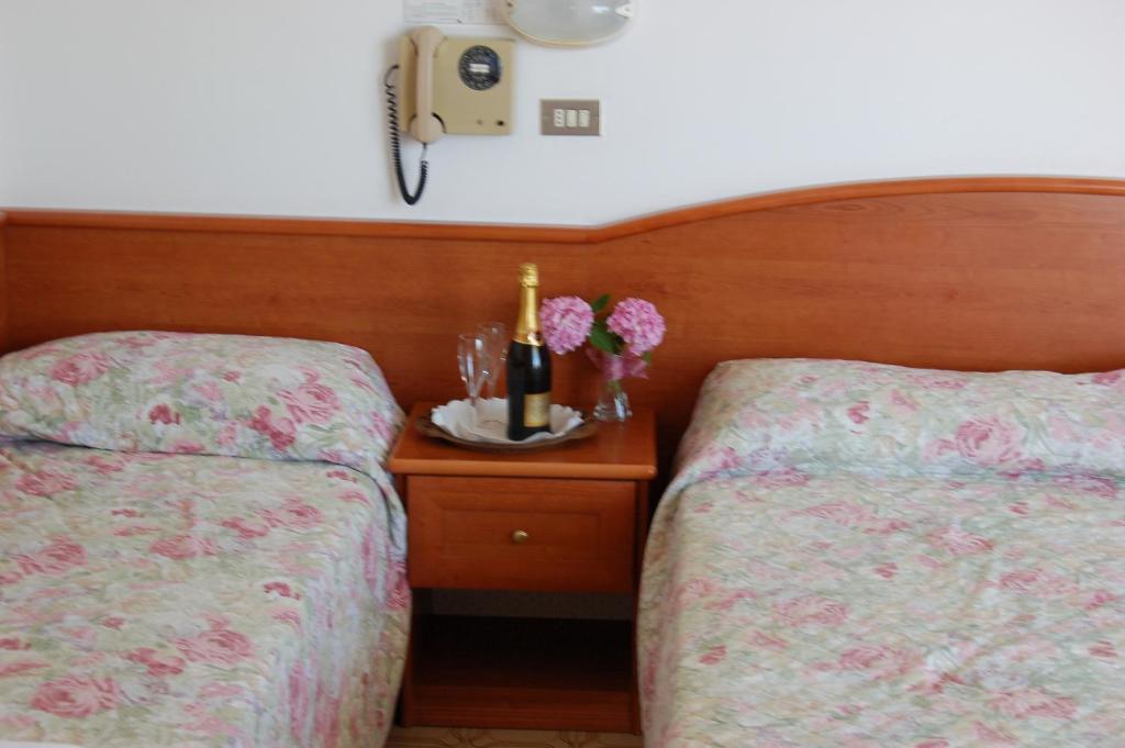 Postel nebo postele na pokoji v ubytování Hotel Villa Verde