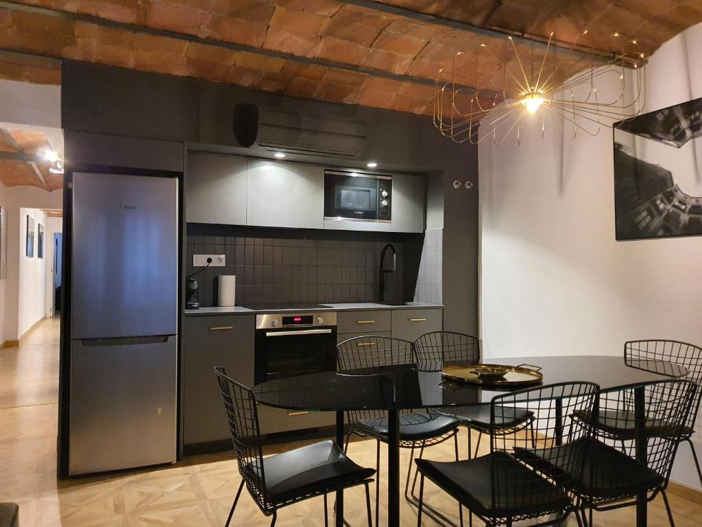 Kuchyň nebo kuchyňský kout v ubytování Barrio Gotico Apartments Escudellers