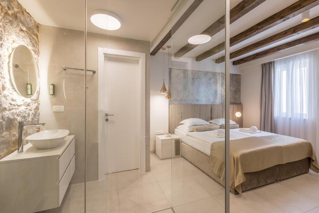 Postel nebo postele na pokoji v ubytování Sperone Hotel