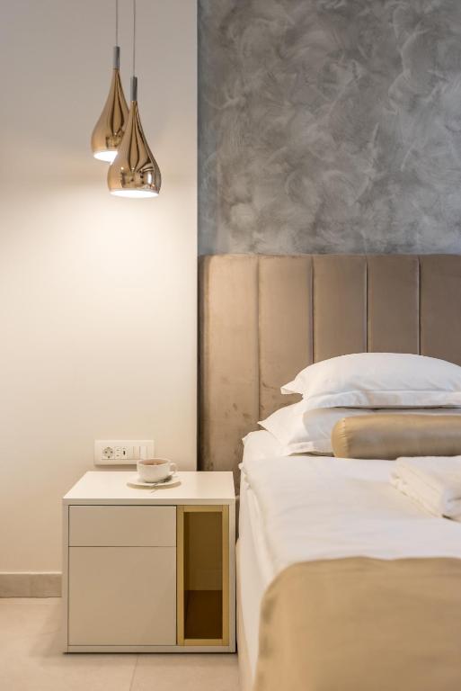 Postel nebo postele na pokoji v ubytování Sperone Hotel