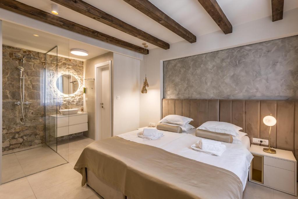 Postel nebo postele na pokoji v ubytování Sperone Hotel