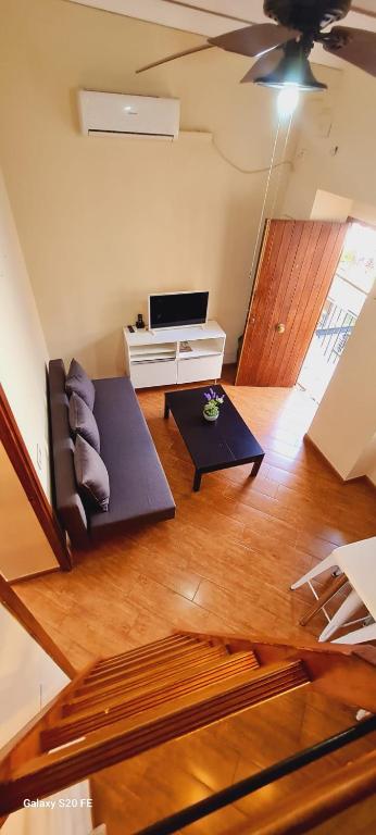 Televízia a/alebo spoločenská miestnosť v ubytovaní Magnifico Apartamento tipo Dúplex en Triana