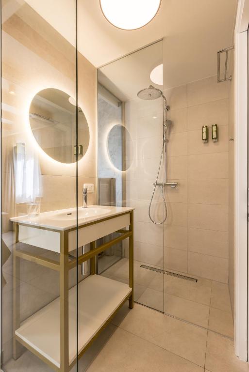 Koupelna v ubytování Sperone Hotel