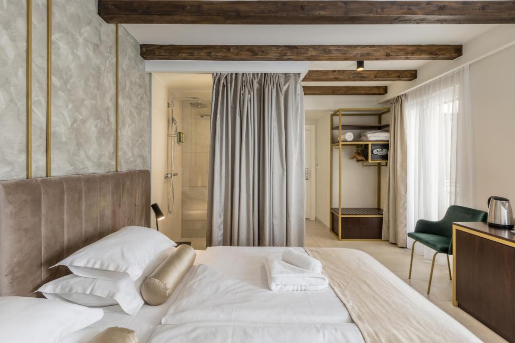 Postel nebo postele na pokoji v ubytování Sperone Hotel