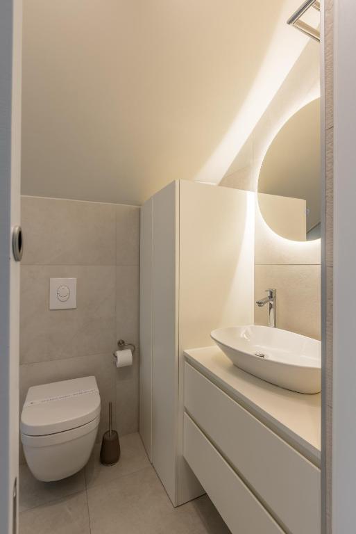 Koupelna v ubytování Sperone Hotel