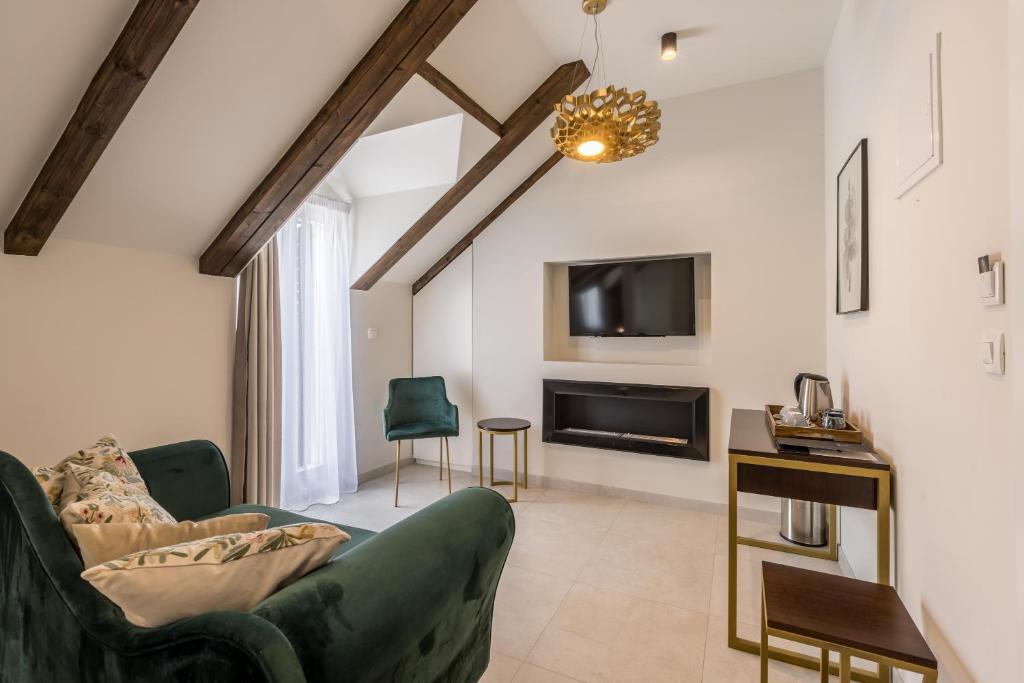 TV a/nebo společenská místnost v ubytování Sperone Hotel