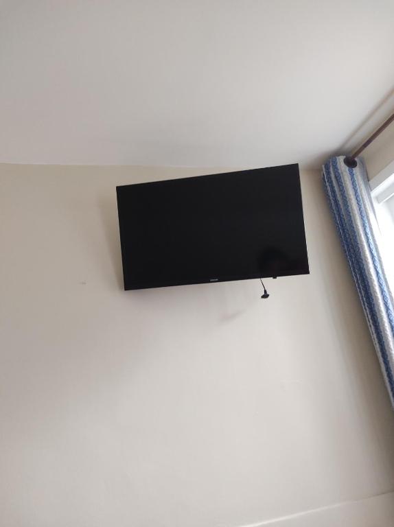 TV a/nebo společenská místnost v ubytování Pousada Mar Azul
