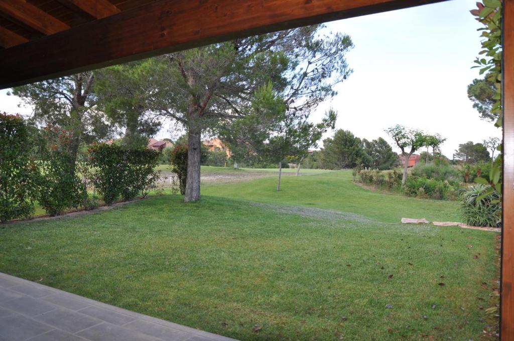 Zahrada ubytování Les Suites Golf Bonmont