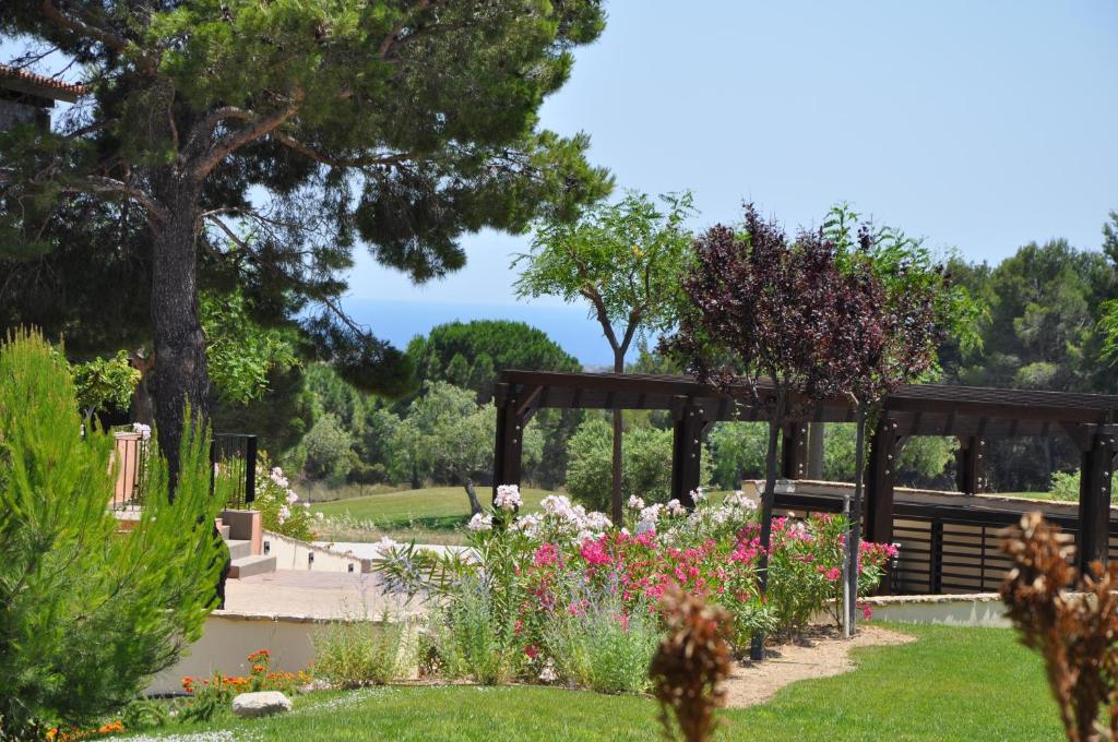 Zahrada ubytování Les Suites Golf Bonmont