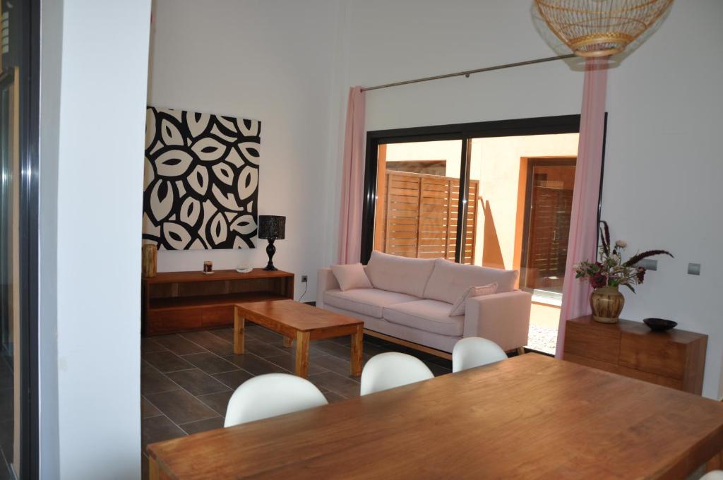 Posezení v ubytování Les Suites Golf Bonmont