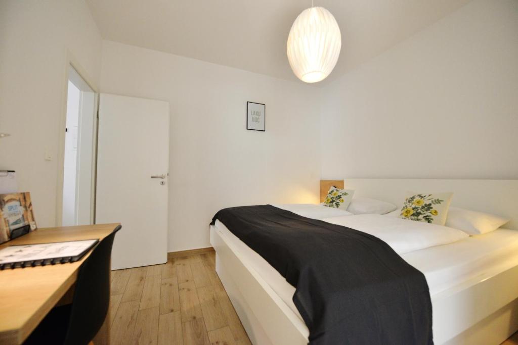 Posteľ alebo postele v izbe v ubytovaní Apartments Villa Tećo mit Pool