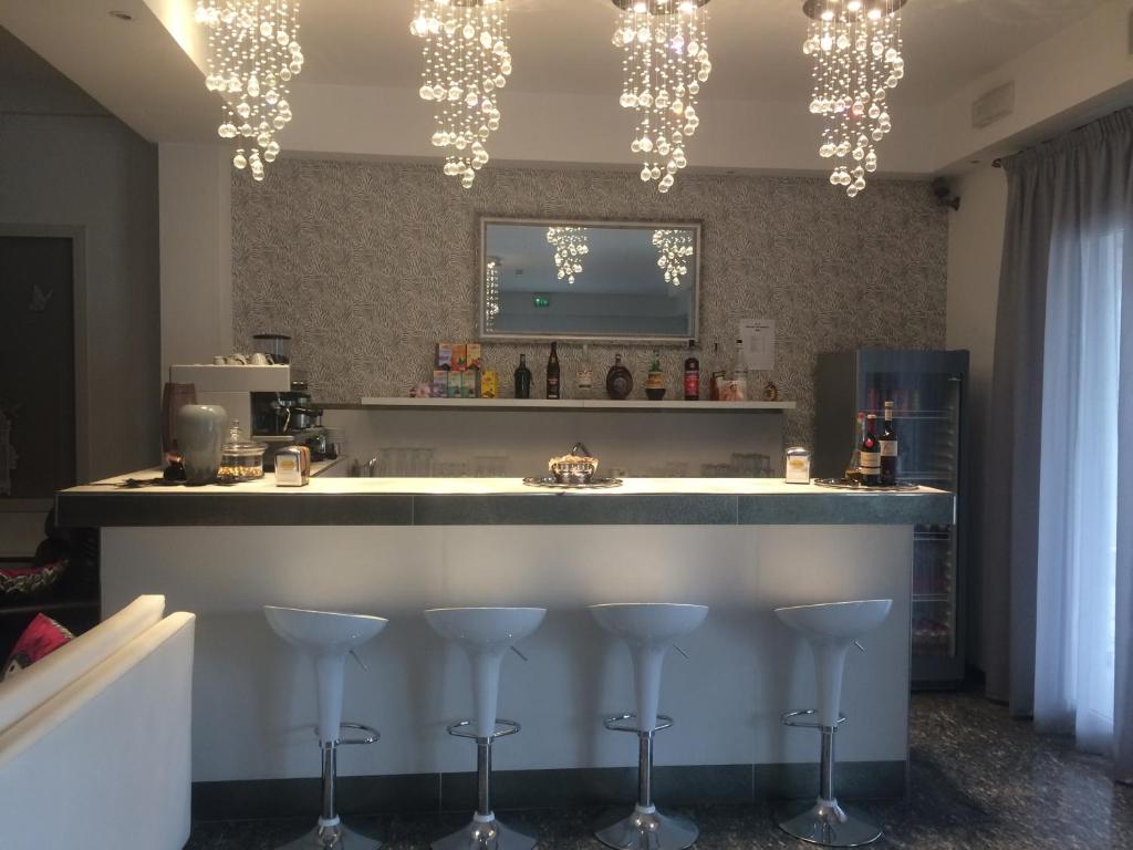 Nápoje v ubytování Hotel Vela D'Oro