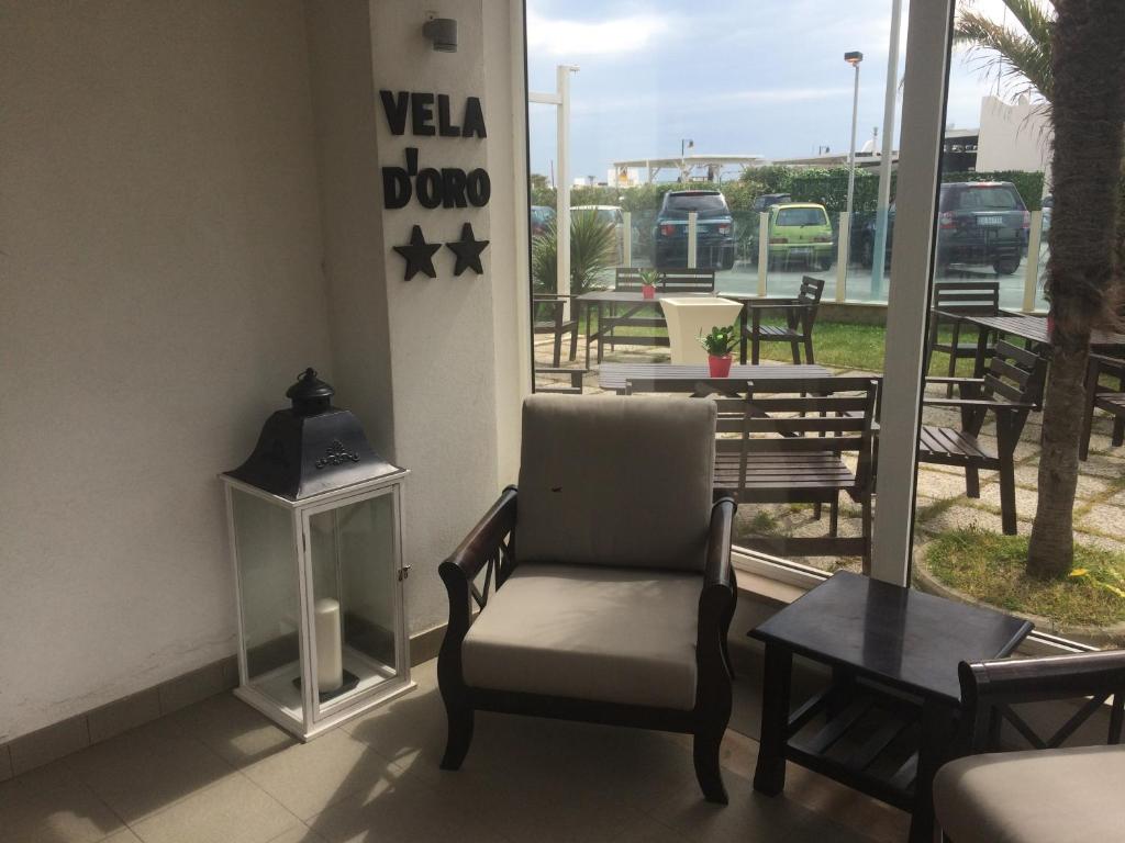 Posezení v ubytování Hotel Vela D'Oro