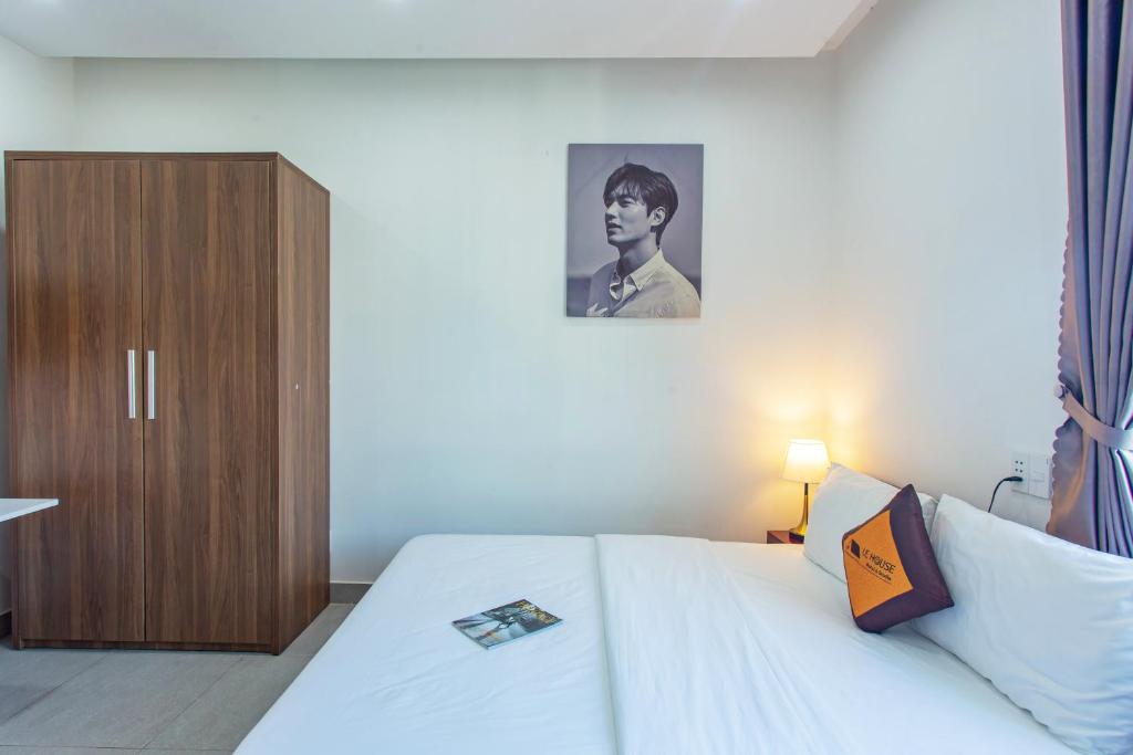 Postel nebo postele na pokoji v ubytování Le House Hotel and Studio