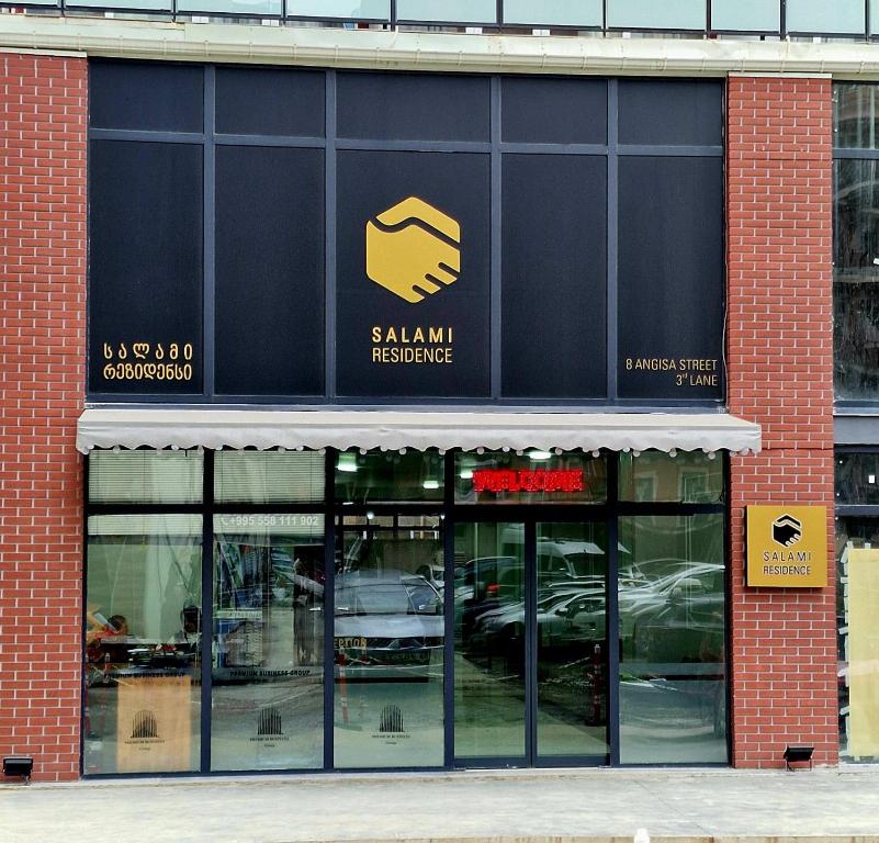 a store front with a swan hardware sign on it at Salami Residence in Batumi