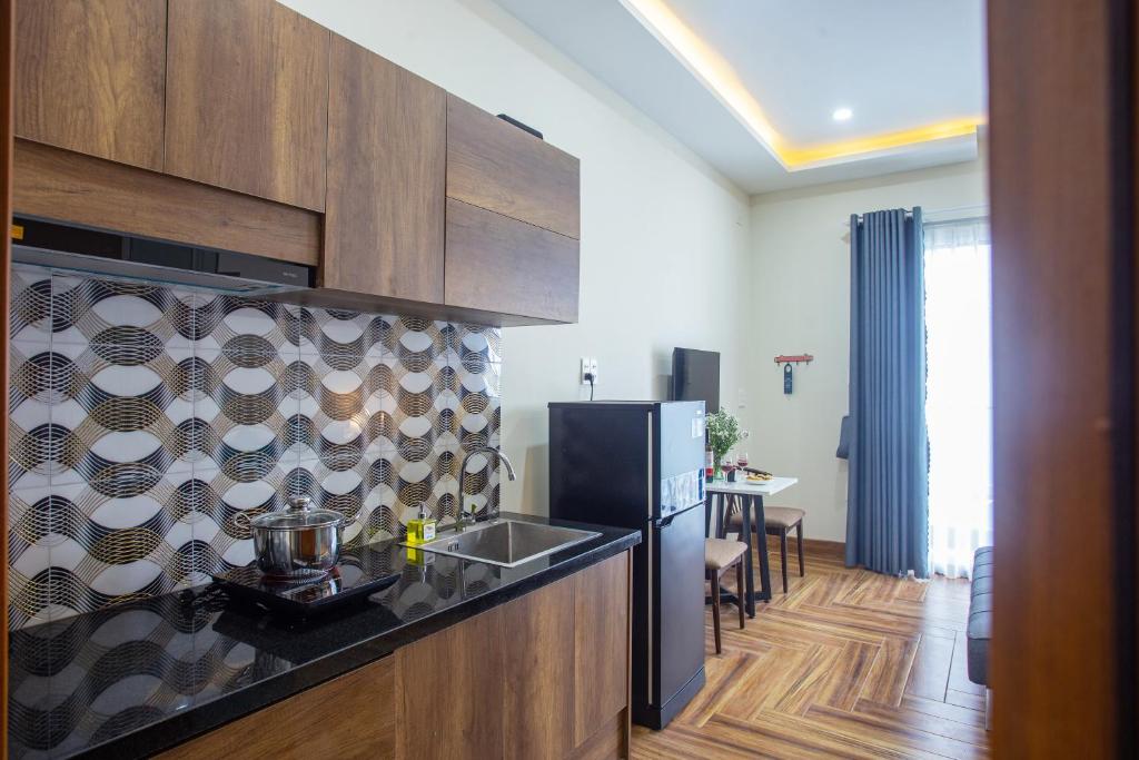 TV a/nebo společenská místnost v ubytování Le House Hotel and Studio