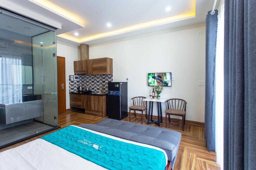 Postel nebo postele na pokoji v ubytování Le House Hotel and Studio