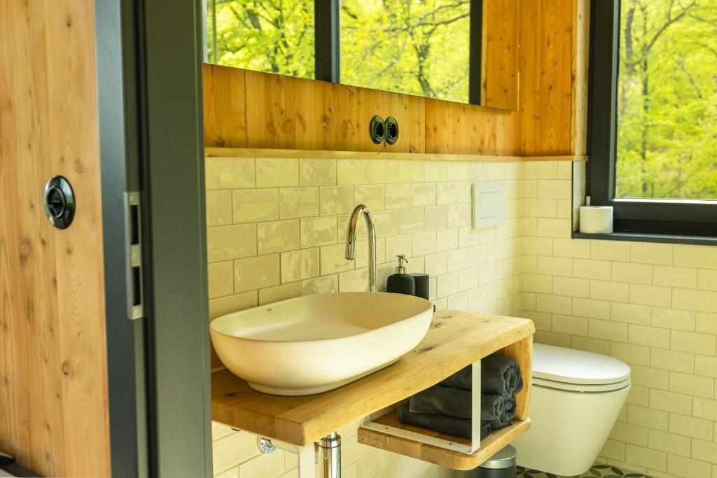Koupelna v ubytování Baumhausapartment