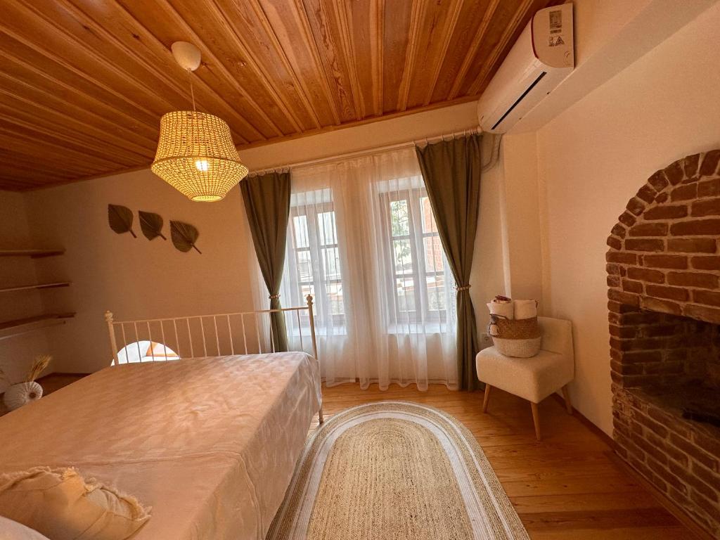 Postel nebo postele na pokoji v ubytování Hanole Guest House