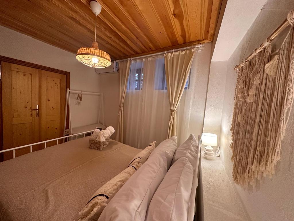 Postel nebo postele na pokoji v ubytování Hanole Guest House