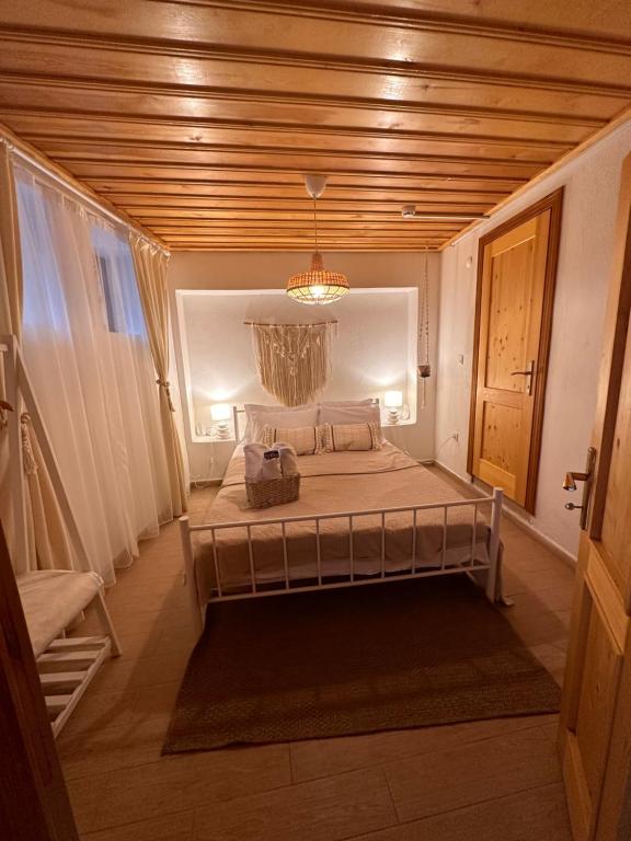 Postel nebo postele na pokoji v ubytování Hanole Guest House