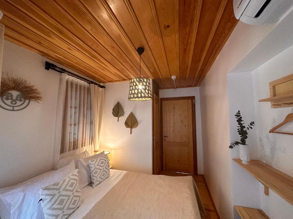 Postel nebo postele na pokoji v ubytování Hanole Guest House