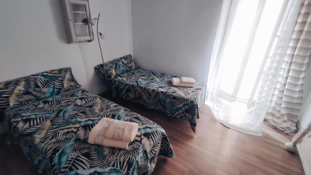 Postel nebo postele na pokoji v ubytování Apartament Picasso
