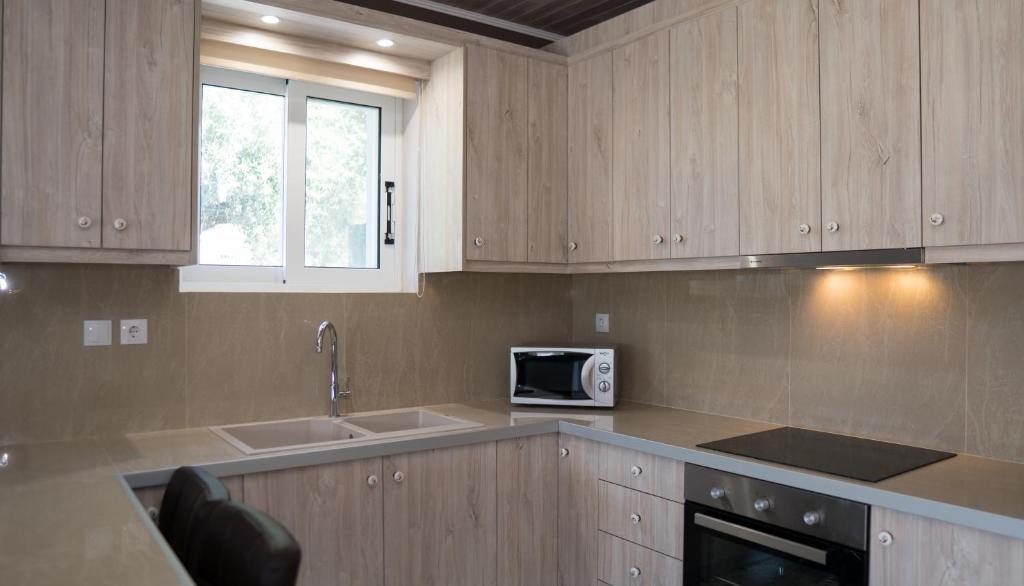Kuchyň nebo kuchyňský kout v ubytování Nafsika House