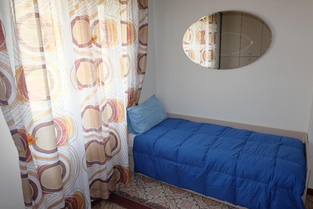Postel nebo postele na pokoji v ubytování B&B L'Edera