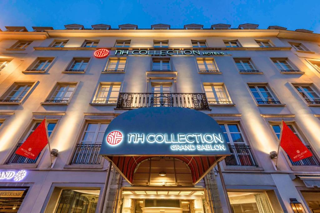 uma representação do hotel de recolha de gucci em Paris em NH Collection Brussels Grand Sablon em Bruxelas