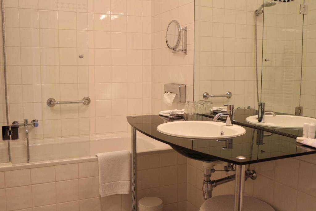 Koupelna v ubytování Hotel Seeschlößl Velden