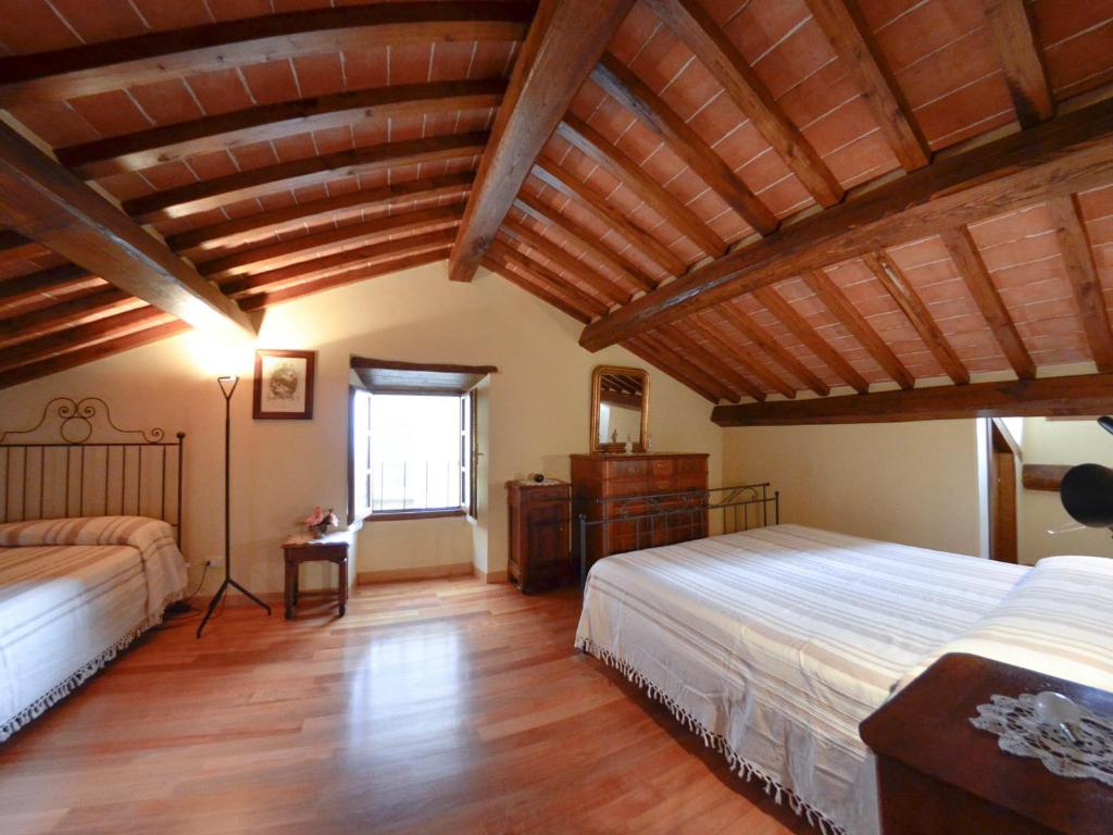 Posteľ alebo postele v izbe v ubytovaní Casa Ambra