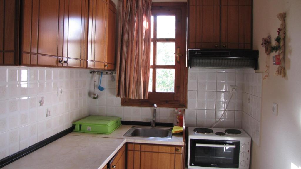 Kuchnia lub aneks kuchenny w obiekcie Rafaela House