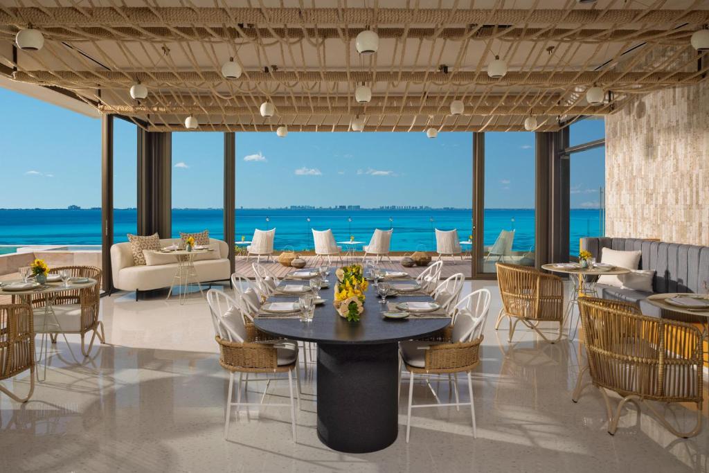 Гостиная зона в Impression Isla Mujeres by Secrets - Adults Only - All Inclusive