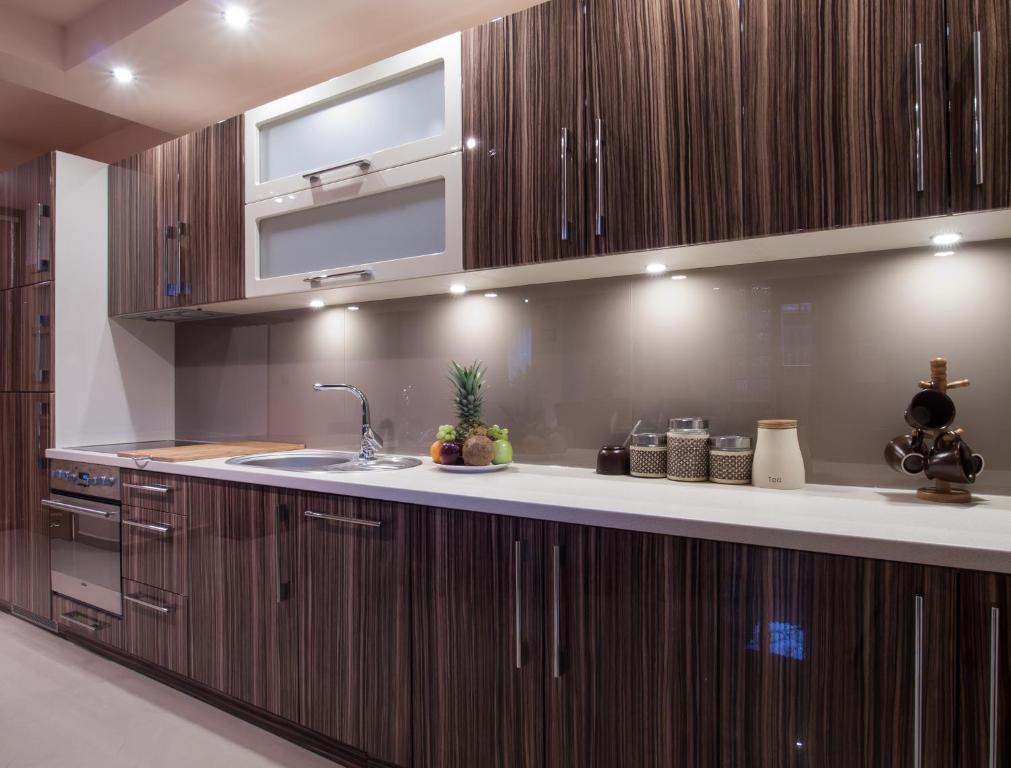Kuchyňa alebo kuchynka v ubytovaní Apartament Familijny Tatrzański