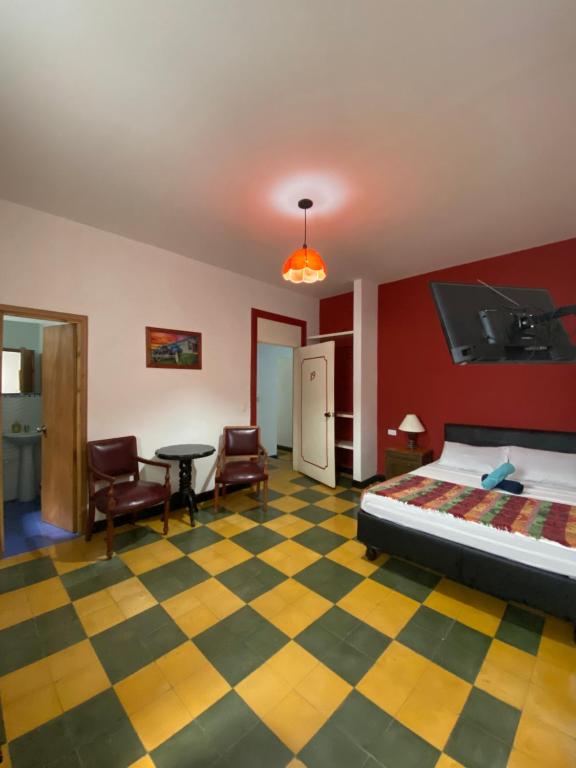 Postel nebo postele na pokoji v ubytování Havana Hostel Cali & Dance School