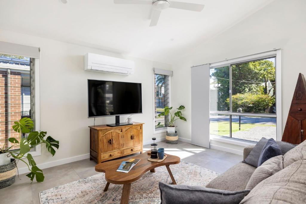 TV o dispositivi per l'intrattenimento presso Taylors Beach Cottage