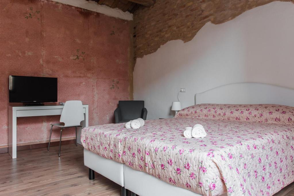 Appartamenti Ravennaにあるベッド