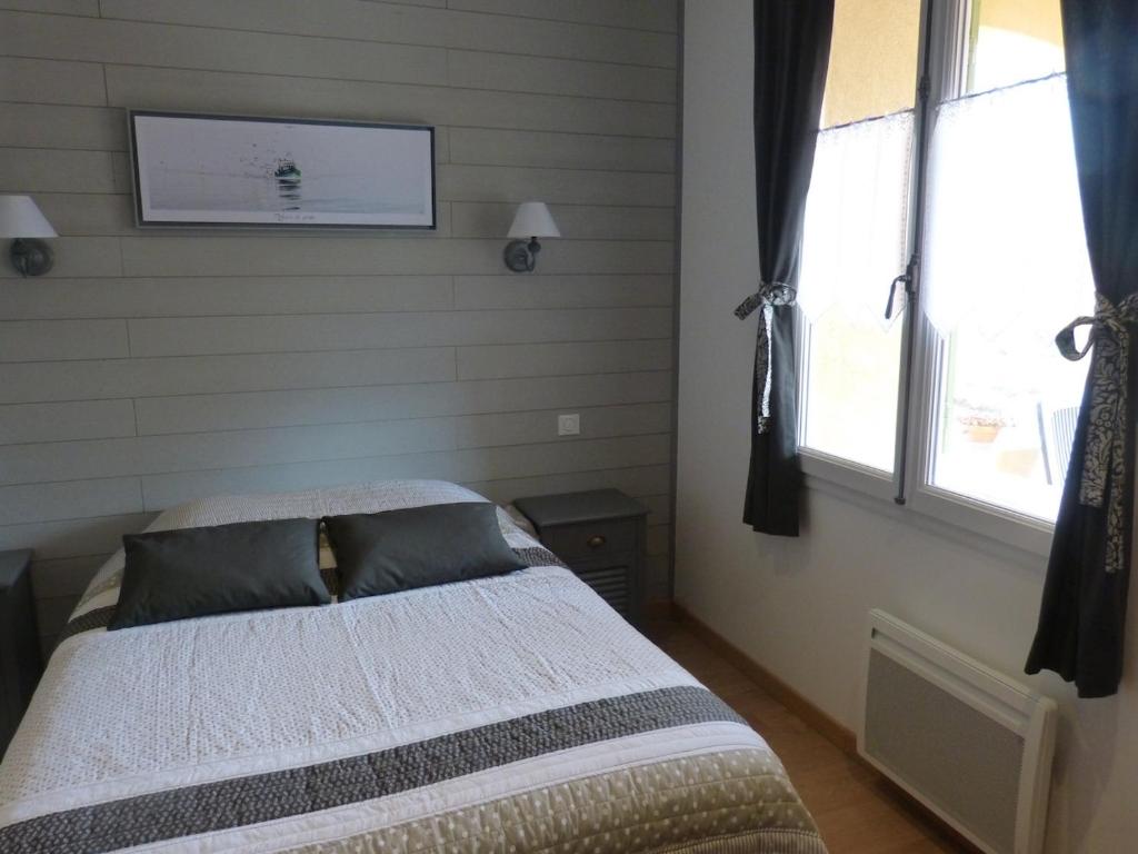 Postel nebo postele na pokoji v ubytování Gîte du Pagoulin - Chambres d'hôtes
