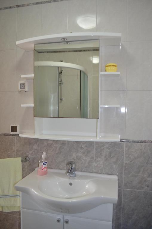 Koupelna v ubytování Apartments Lora