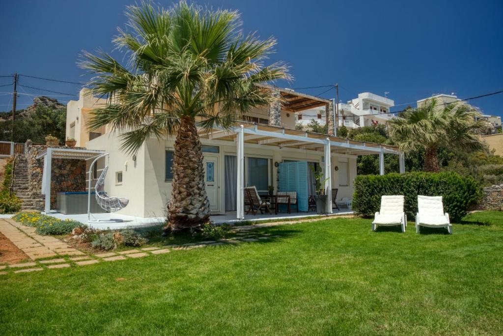 Zahrada ubytování Junior suite by the beach Stalida